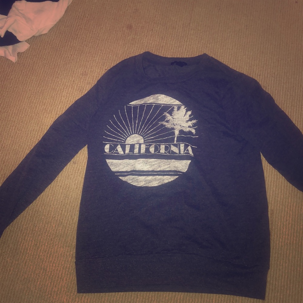 A dark blue long sleeves shirt